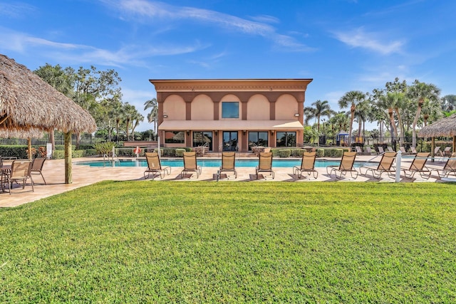 view of swimming pool featuring a gazebo and a lawn