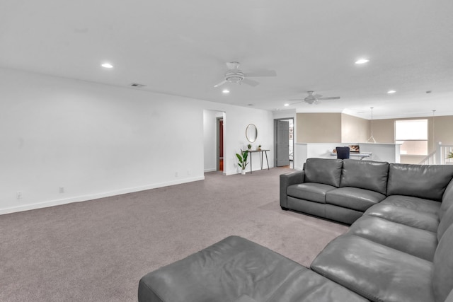 living room featuring light colored carpet