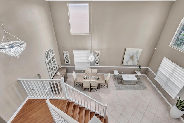 living room featuring hardwood / wood-style floors and a chandelier