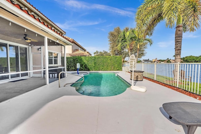 view of pool featuring ceiling fan and a patio area