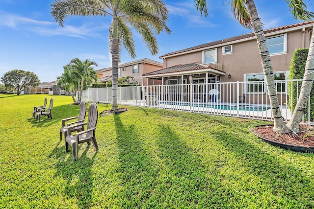 view of yard featuring a fenced in pool