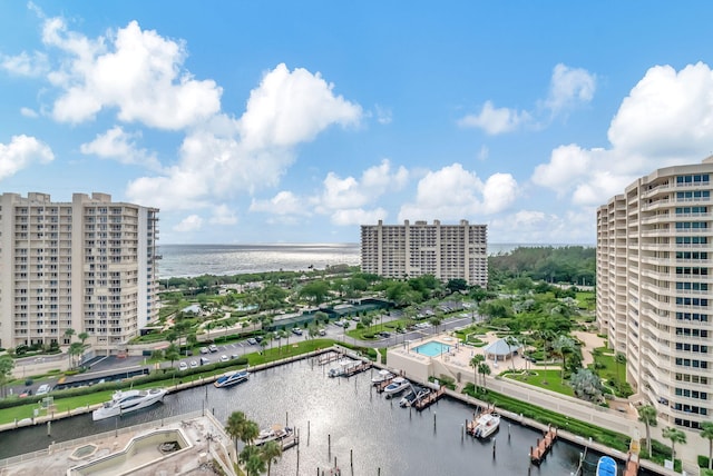 birds eye view of property featuring a water view