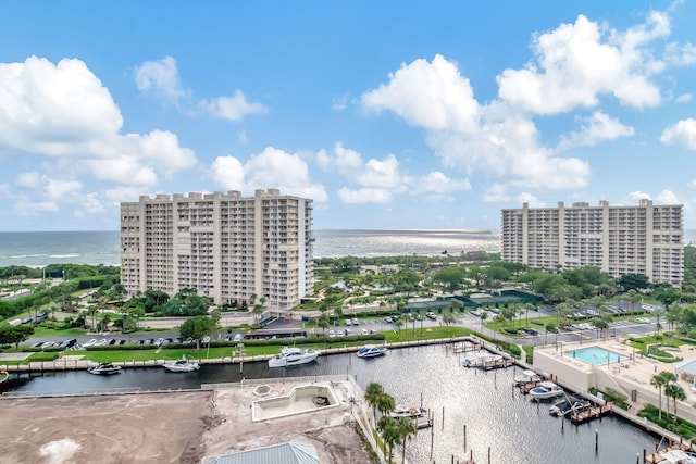 birds eye view of property featuring a water view