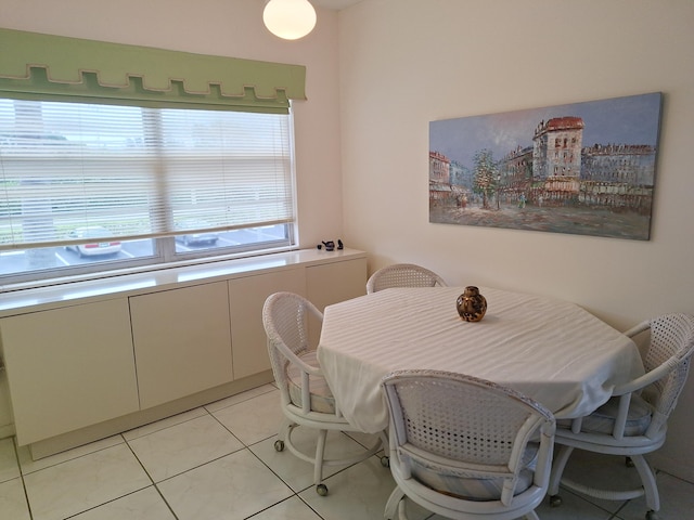 dining room featuring light tile patterned flooring