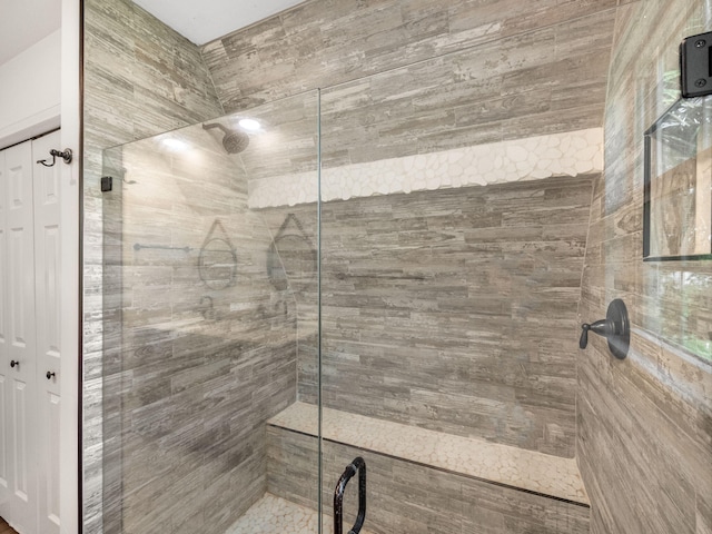 bathroom featuring walk in shower