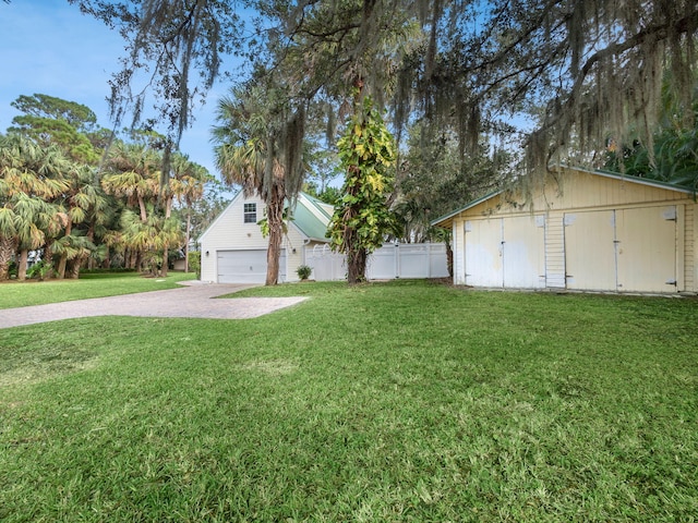 view of yard with a garage