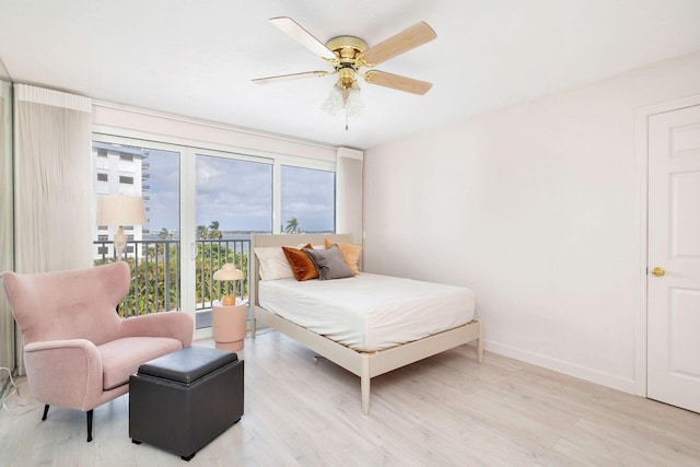 bedroom featuring light wood-type flooring and ceiling fan