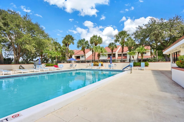 view of pool featuring a patio area