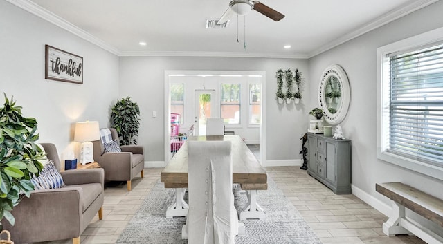 interior space featuring ceiling fan and crown molding