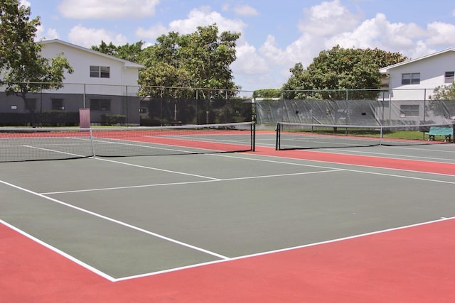 view of sport court featuring basketball hoop