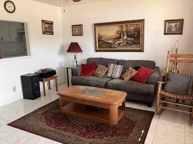 tiled living room with ceiling fan