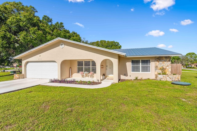 ranch-style house with a garage and a front lawn