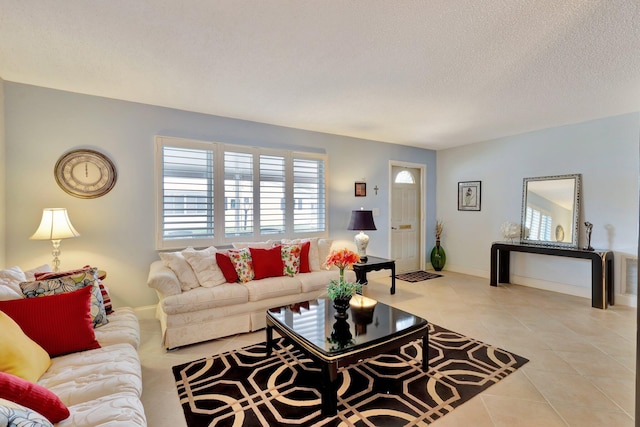 tiled living room with a textured ceiling