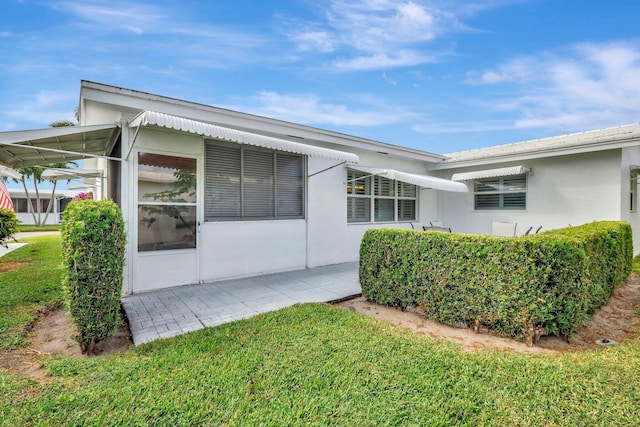 exterior space featuring a yard