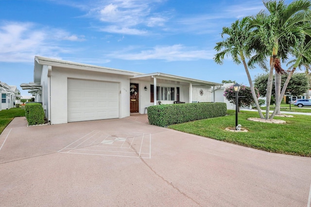 ranch-style house with a front lawn and a garage