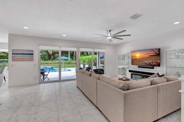 living room featuring ceiling fan