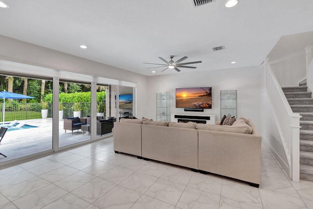 living room with ceiling fan