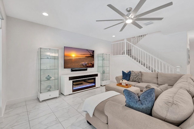 living room with ceiling fan