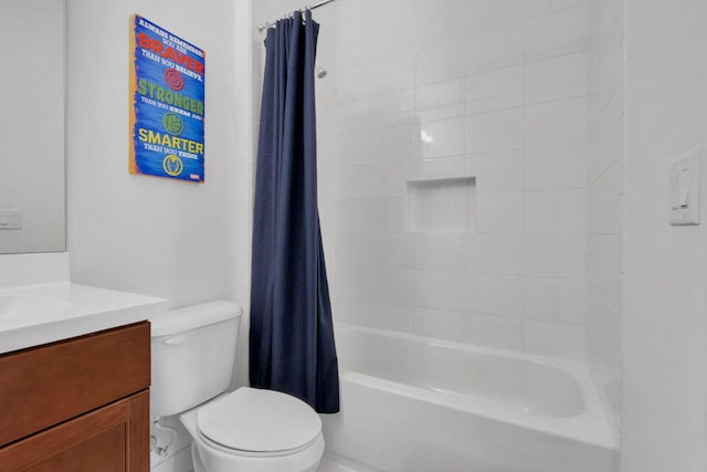 full bathroom featuring vanity, toilet, and shower / tub combo