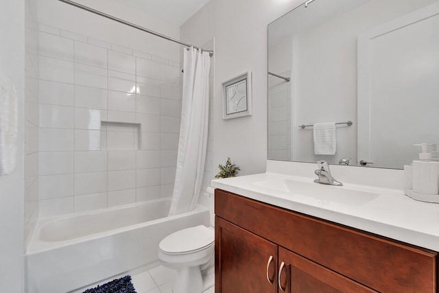 full bathroom featuring tile patterned floors, vanity, shower / tub combo, and toilet