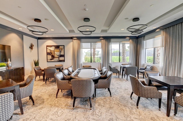 dining area with beam ceiling