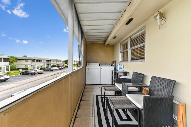 balcony with washer and dryer