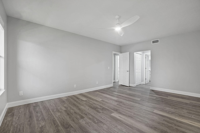 unfurnished room featuring hardwood / wood-style flooring and ceiling fan