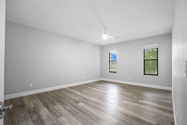 unfurnished room featuring wood-type flooring and ceiling fan