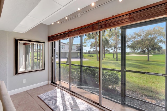 unfurnished sunroom featuring a healthy amount of sunlight