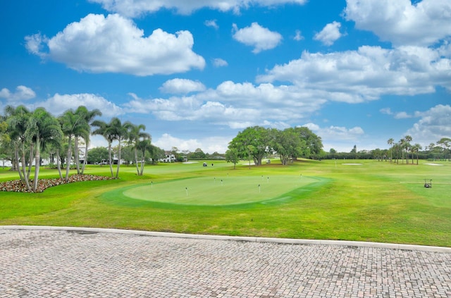 surrounding community featuring a lawn