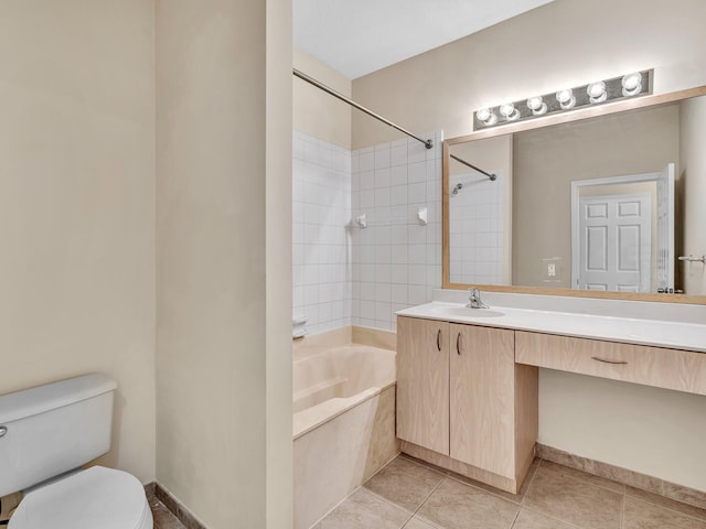 full bathroom with toilet, vanity, tiled shower / bath, and tile patterned flooring