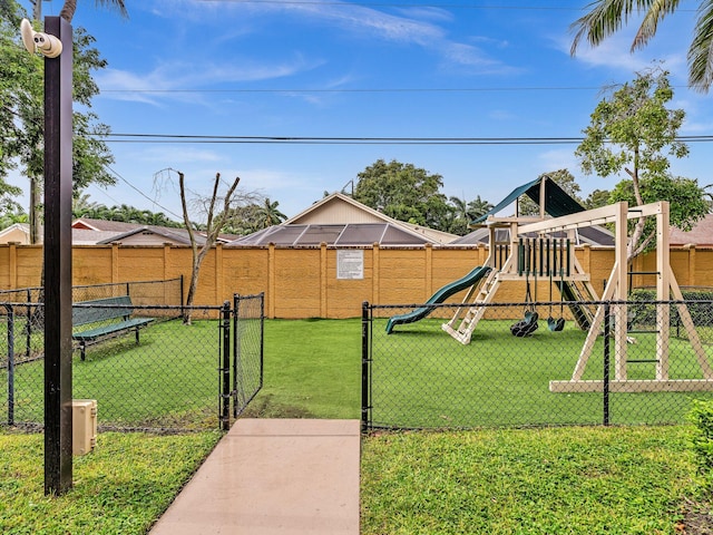 view of playground with a yard