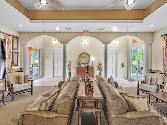 interior space with access to outside, decorative columns, and multiple windows