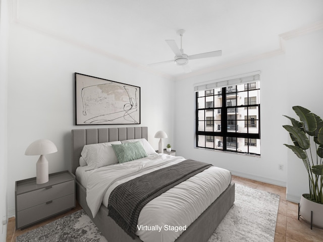 tiled bedroom with ceiling fan and crown molding