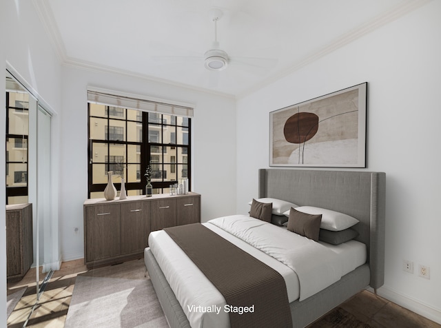 bedroom featuring ceiling fan and ornamental molding