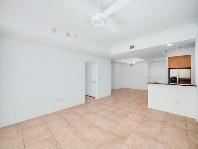 spare room with ornamental molding, ceiling fan with notable chandelier, and light tile patterned flooring