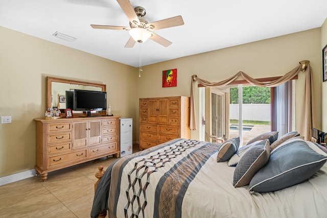 tiled bedroom with access to outside and ceiling fan