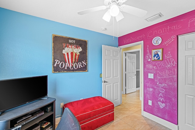 bedroom with tile patterned flooring and ceiling fan