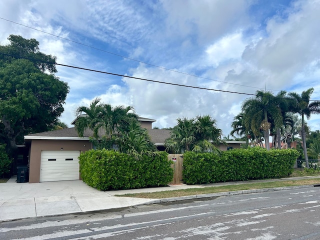 view of front of home with a garage