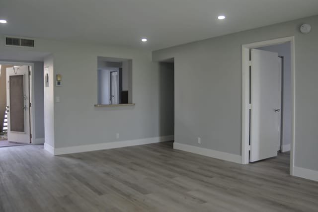 empty room featuring light hardwood / wood-style floors