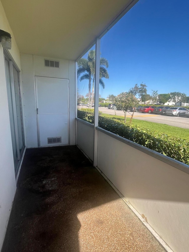 view of unfurnished sunroom