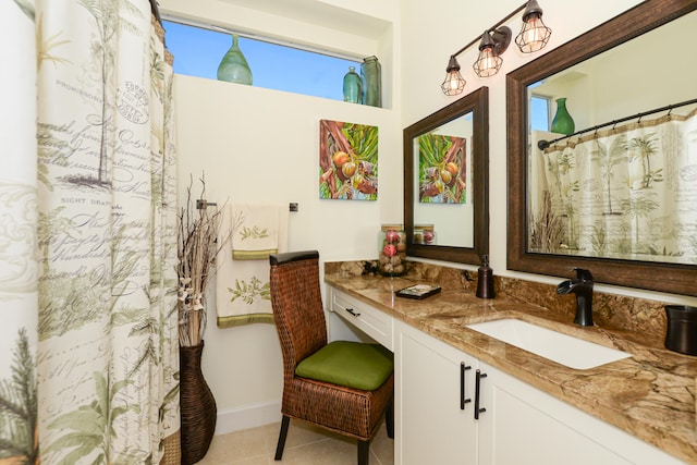 bathroom featuring a shower with curtain, tile patterned flooring, and vanity