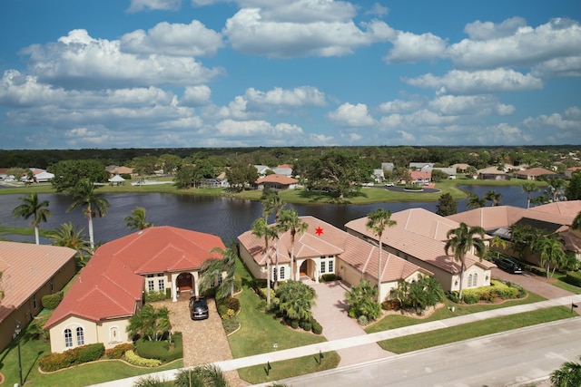 bird's eye view with a water view