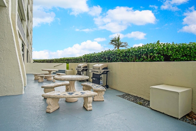 view of patio with a grill