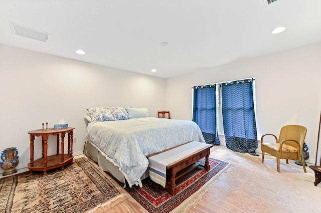 bedroom with light hardwood / wood-style flooring