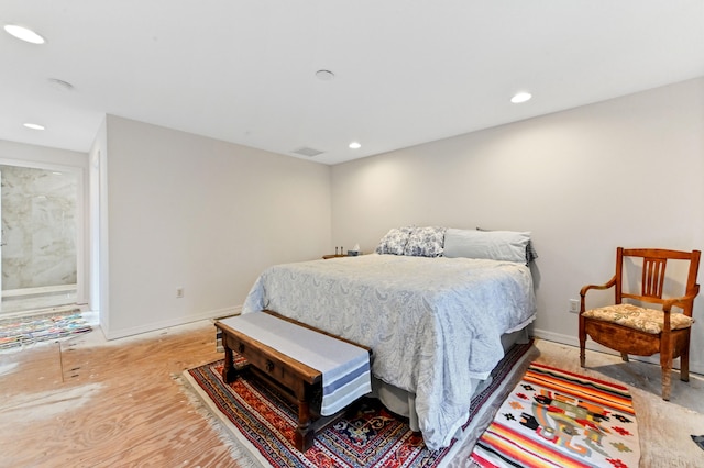 bedroom with light hardwood / wood-style flooring