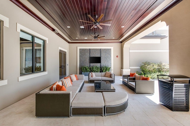 view of patio featuring ceiling fan and an outdoor hangout area