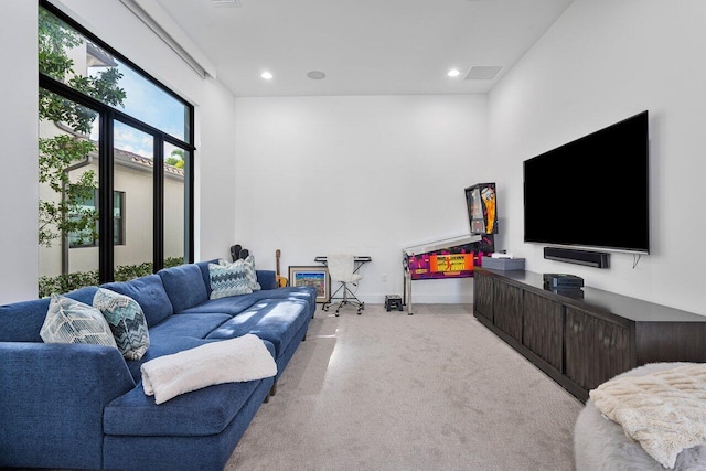 living room with light colored carpet