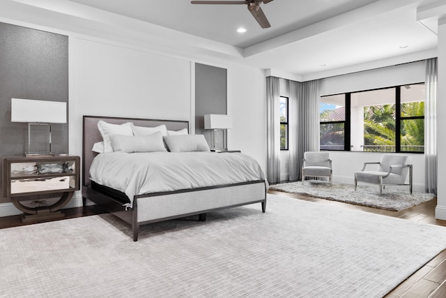 bedroom featuring light wood-type flooring and ceiling fan