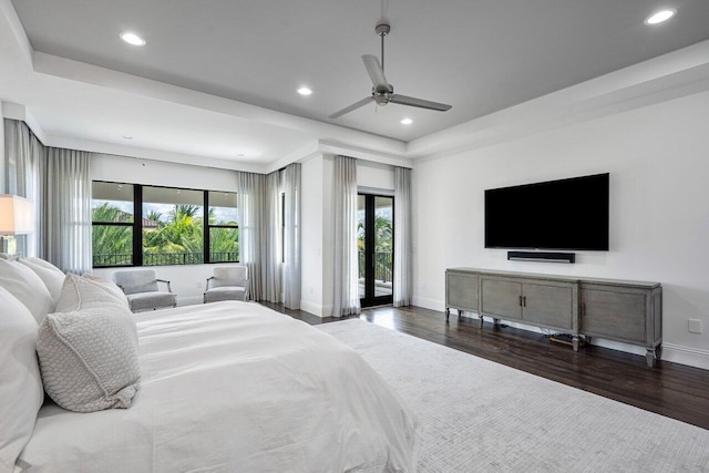 bedroom featuring access to exterior, ceiling fan, and dark hardwood / wood-style flooring